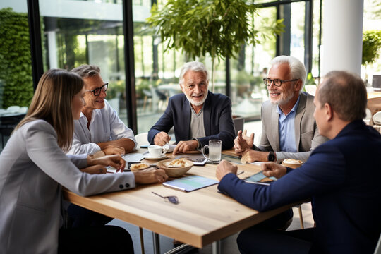 A portrait of a multigenerational business team exchanging ideas and insights during a meeting, with active participation from everyone Generative AI