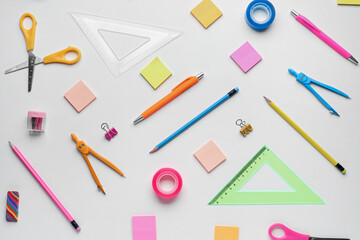 Composition with different stationery on light background