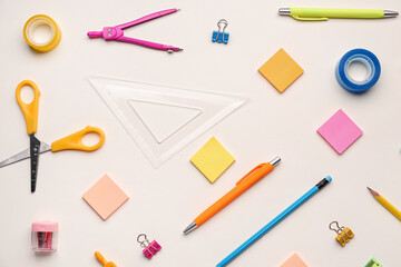 Composition with different stationery on light background