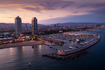 Drone view of the evening Barcelona, the capital of Catalonia, on the Mediterranean coast, Spain