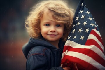A child with the US flag at the celebration of the Independence Day of the United States of America