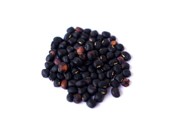 Dried black beans seeds, isolated on white background. Concept, Agriculture crops. Dried for preparing to select for next time seedling or for cooking. Thai native breed of beans.   