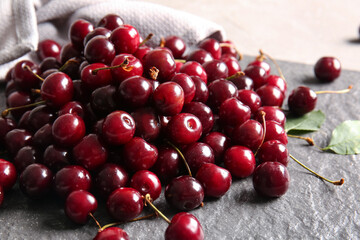 Board with sweet cherries, closeup