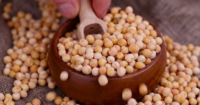 raw yellow peas scattered before cooking, Round yellow peas for cooking porridge