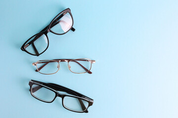 glasses for vision correction on a colored background with space for text
