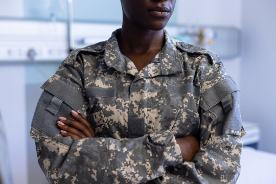 African american woman female soldier military uniform crossing arms at hospital