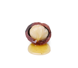 Delicious organic Macadamia nut isolated on white