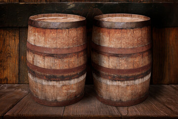 Wooden barrels on brown shelf near textured wall