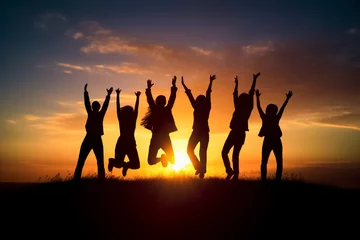 Selbstklebende Fototapete Dämmerung Big group of people having fun in success victory and happy pose with raised arms on mountain top against sunset lakes and mountains. Generative AI.