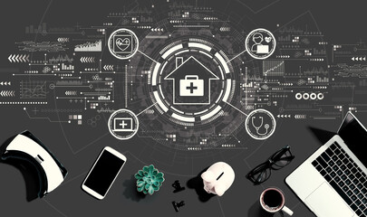 Telehealth theme with electronic gadgets and office supplies - flat lay