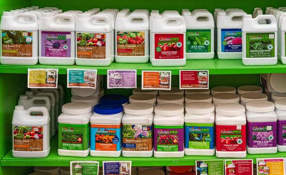 Local garden center with stacks of natural and synthetic multinutrient fertilizers. Different fertilizers in a shop