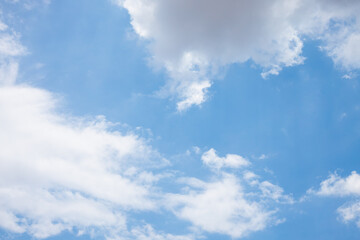Fototapeta premium Clouds in the blue sky. Summer blue sky cloud gradient light white background. Beauty clear cloudy in sunshine calm bright winter air bacground. Image of beautiful blue sky.