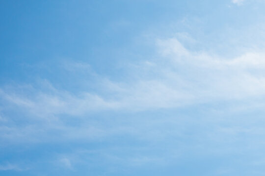 Clouds in the blue sky. Summer blue sky cloud gradient light white background. Beauty clear cloudy in sunshine calm bright winter air bacground. Image of beautiful blue sky.