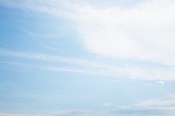 Clouds in the blue sky. Summer blue sky cloud gradient light white background. Beauty clear cloudy in sunshine calm bright winter air bacground. Image of beautiful blue sky.