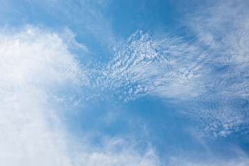 Clouds in the blue sky. Summer blue sky cloud gradient light white background. Beauty clear cloudy in sunshine calm bright winter air bacground. Image of beautiful blue sky.