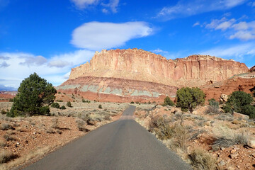 Road through colorful sandstone rock formations at Capitol Reef National Park, Utah, USA
