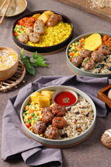 K-FOOD: Korean diet dishes, meatballs, eggs, tomatoes, meat, sausages organized on the table