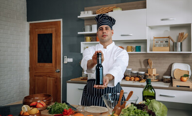 The skilled master chef prepares a vegetable wrap with great passion and care. Mix all the...