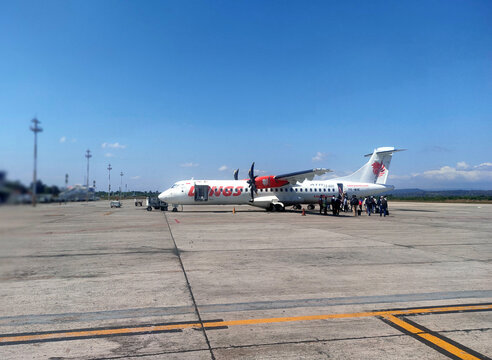 Kupang, Indonesia - June 28, 2023 : An airplane parked at El Tari international airport in Kupang