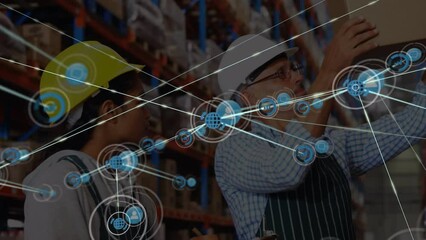 Animation of connected globe and graph icons, diverse coworkers checking cardboard box in warehouse - Powered by Adobe