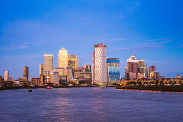 london skyline at Canary Wharf by river thames