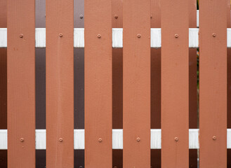 Brown wooden fence line, close-up shot