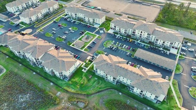 View from above of apartment residential condos in Florida suburban area. American condominiums as example of real estate development in USA suburbs