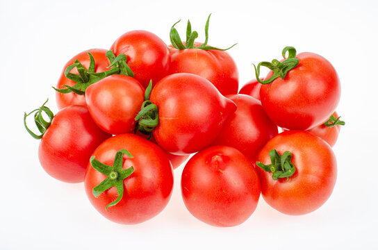 Bunch of ripe fresh pink farm tomatoes with isolated on white background. Studio Photo.