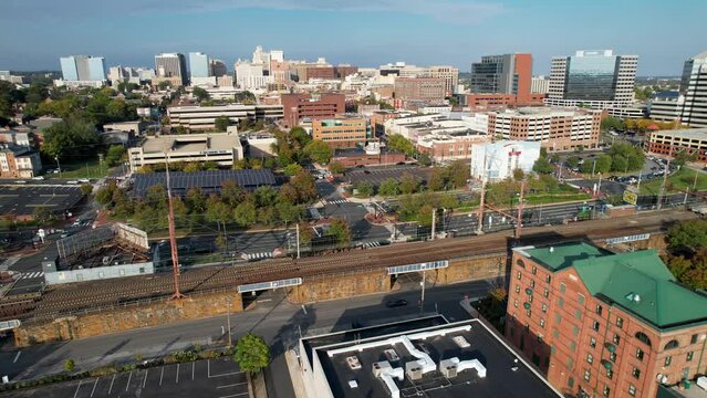 Wilmington Delaware drone push up river to skyline on sunny afternoon
