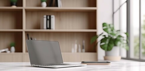 Fototapeta premium Modern Office Workspace with Laptop on Table for Business. Copy Space Available