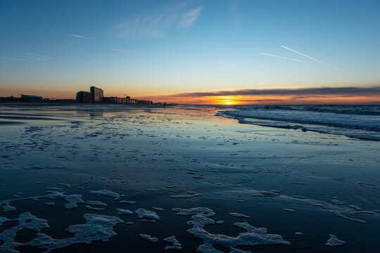 Oostende North Sea beach at sunset, Flanders, Belgium.