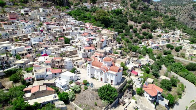 Aerial view of St. George church in Kritsa from Crete, Greece. Orbit shot of the church.