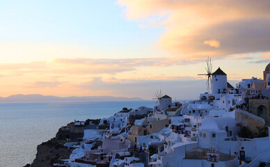 Fototapeta premium The famous of landscape view point as Sunset sky scene at Oia town on Santorini island, Greece