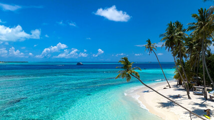 The summer tropical on the sandy beach and turquoise Tropical beach with blue sky background
