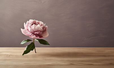  a single pink flower on a wooden table with a wall in the background.  generative ai