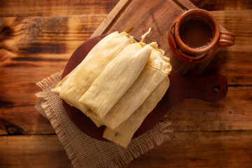 Tamales. Prehispanic dish typical of Mexico and some Latin American countries. Corn dough wrapped in corn leaves. The tamales are steamed.