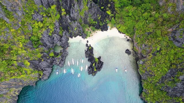 Aerial top down perspective of bangka outrigger canoes of elnido palawan