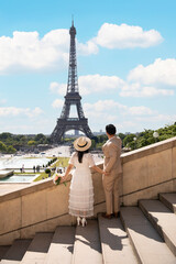 Pre-wedding shoot of young Asian couple in Paris, France during summer time.