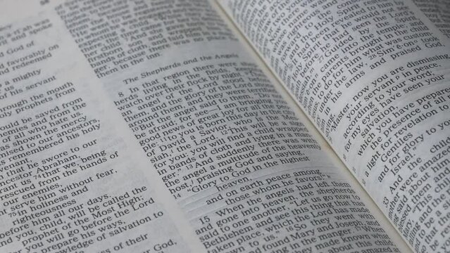 The passage on Luke chapter 1 of the bible that talks about the Messiah is born. Panning, close up views.