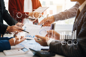 Fototapeta premium Financial report data of business operations balance sheet and income statement and diagram as Fintech concept.Business team meeting. digital tablet and computer laptop...