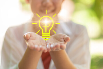 happy people with lightbulb icon bright in hand support for creativity life ignition for saving...