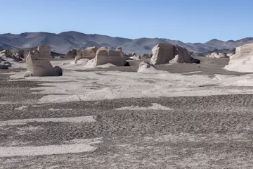 Fototapeten PUNA - Campo de Piedra Pomez, a bizarre but beautiful landscape in the Argentinian highlands with a field of pumice, volcanic rocks and dunes of sand © freedom_wanted