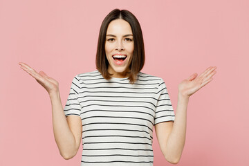 Young surprised shocked happy fun caucasian woman she wears casual clothes t-shirt look camera...