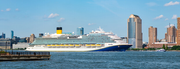 Luxury cruise ship sailing to port on sunrise. cruise boat near New york Manhattan. Floating liner...