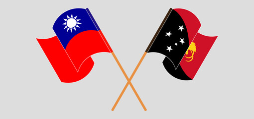 Crossed and waving flags of Taiwan and Papua New Guinea