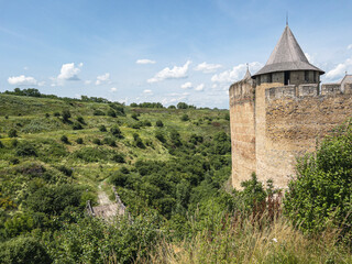 Landscape view of castle tower and mountains