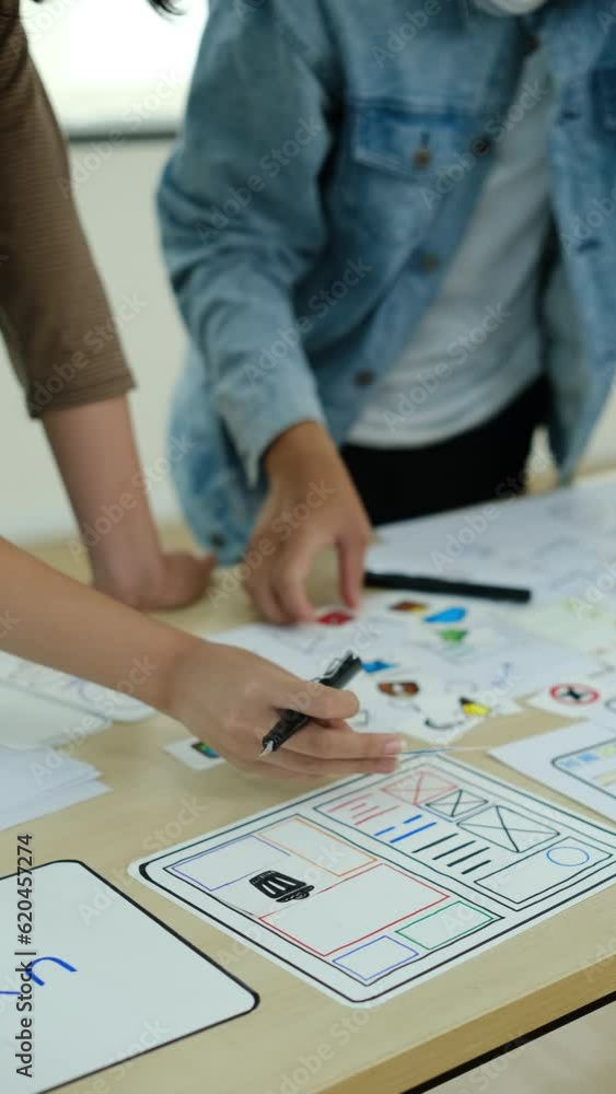 Poster professionals developer team are planning, creating mobile application prototype at co working offic