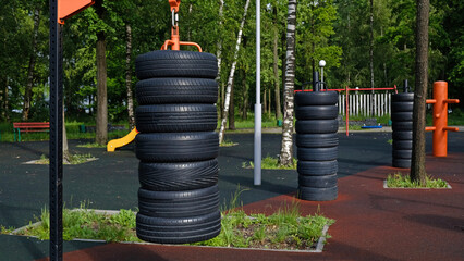 Urban sports ground with weight training and exercise equipment for sports. Sports and recreation area. Empty sports ground outdoor workout in a park.