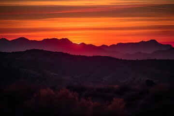 Fototapeta na wymiar A stunning sunset over a mountain range - Generative AI
