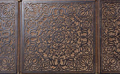 Beautiful pattern on metal bronze slabs for paving the floor.